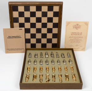 LARRY PICKERING "Dismissal" novelty chess set. Limited edition 248/1000. Hand-cast pewter with 22ct yellow and white gold plating. Signed by Pickering, circa 1980, the board 46 x 46cm.