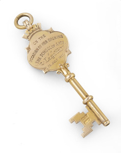 LAMBORN & WAGNER of Melbourne 15ct gold key, engraved "Presented To Mrs. JOHN McPHILLANY On The Occasion Of Her Opening The School Of Arts, Lagoon, 23rd, July, 1902", stamped "L.W. 15ct", 7cm long overall, 10.7 grams.
