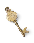LAMBORN & WAGNER of Melbourne 15ct gold key, engraved "Presented To Mrs. JOHN McPHILLANY On The Occasion Of Her Opening The School Of Arts, Lagoon, 23rd, July, 1902", stamped "L.W. 15ct", 7cm long overall, 10.7 grams. - 2