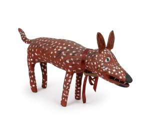 RODERICK YUNKAPORTA (1948 - ), Ku' - Camp Dog, acrylic and natural ochres on milkwood, 64cm high, 30cm wide, 13cm deep.