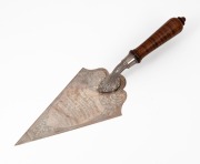 An antique Australian silver presentation trowel with fiddleback blackwood handle, stamped "Molyneux, Silver", engraved "This Trowel Was Presented By The Richmond Branch R.S. & S.I.L.A. To His Excellency The Governor of Victoria, The Earl Of Stradbroke, 