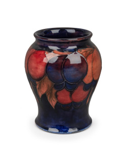MOORCROFT flambe "Wisteria" pattern pottery vase, impressed mark to base, 10.5cm high.