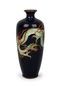 An antique Japanese cloisonne vase decorated with a green dragon on a midnight blue ground, Meiji period, 19th/20th century, ​​​​​​​18cm high.