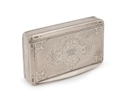 An antique French silver snuff box with engraved decoration and gilt wash interior, 19th century, 9cm wide, 77 grams.