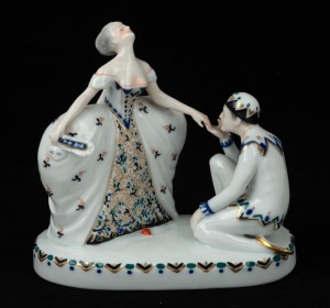 A Continental porcelain figural group, mid 20th century, green factory mark to base, 15cm high.