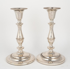 A pair of vintage silver plated candlesticks with weighted bases, 20th century, 24cm high.