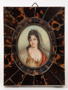 A hand-painted miniature portrait of a lady, housed in a tortoiseshell and piano ivory frame, 19th/20th century, 15 x 12cm overall.