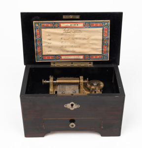 An antique Swiss music box with five changeable aires and original printed tune sheet to the inside of the lid, 19th/20th century, ​​​​​​​10.5cm high, 19cm wide, 10.5cm deep.