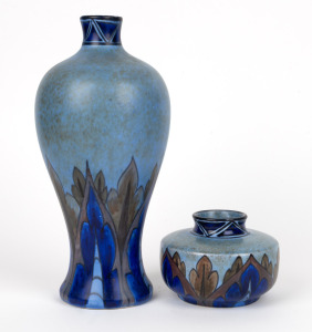 CHAMELEON WARE "Clews Blues" group of two Art Deco pottery vases, made by the George Clews Pottery in Tunstall, Stoke-on-Trent, England, circa 1920, ​​​​​​​27cm and 8.5cm high.
