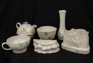 BELLEEK Irish porcelain segmented teapot with butterfly decoration, sugar basin, stem vase, candle holder and boat dish, (5 items), green, brown and modern blue factory marks to the bases, ​​​​​​the vase 14cm high.