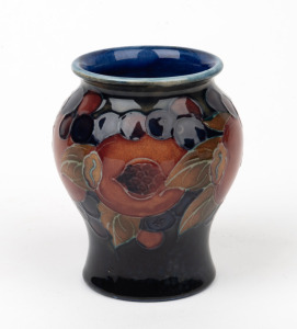 MOORCROFT "Pomegranate" miniature vase on blue ground, impressed "Moorcroft, England", ​​​​​​​8cm high.