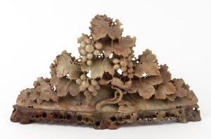 A vintage Chinese carved soapstone ornament, mid 20th century, ​​​​​​​16cm high, 27cm wide.