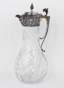 An English sterling silver mounted cut crystal claret jug with griffin handle, 20th century, 32cm high. - 2