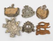 A group, including two 1914-18 British War Medals, a 1941-5 Burma Star, a 1939 German medal, various English County military hat badges, a 1964 Malawi Independence medal, a Rhodesia 1965 Independence silver medal, etc. (Total: 17 items). - 5