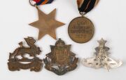 A group, including two 1914-18 British War Medals, a 1941-5 Burma Star, a 1939 German medal, various English County military hat badges, a 1964 Malawi Independence medal, a Rhodesia 1965 Independence silver medal, etc. (Total: 17 items). - 7