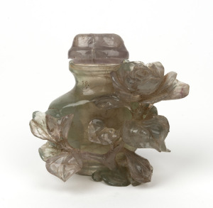 A Chinese carved rock crystal lidded urn, 20th century. ​​​​​​​9.5cm high.
