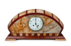 A French Art Deco rouge marble and onyx cased mantle clock with eight day time and bell striking movement by MARTI, circa 1925, 25cm high, 50cm wide.