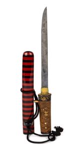 An antique Japanese tanto in striped lacquered scabbard, Meiji period, 19th century, 30cm long.