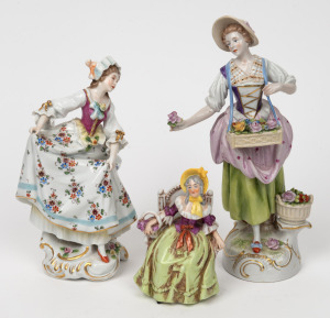 Three Continental porcelain statues of ladies, 19th/20th century, ​​​​​​​the largest 25cm high.