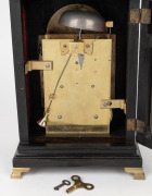 A Georgian spring table clock in ebonized bell-top case with break arch dial, strike silent subsidiary, recessed maker's plate "PAUL RIMBAULT, LONDON", date aperture above the "6" and silver chapter ring with Roman numerals and Arabic minute track. Fusee - 4