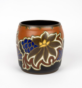 GOUDA Dutch pottery vase on brown and cream ground, early 20th century, factory mark to base, 18cm high, 17cm wide.