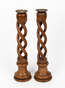 A pair of English beech triple helix candlesticks with brass drip pans, early 20th century, ​​​​​​​35cm high.