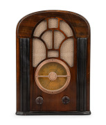 AIRZONE walnut veneer case tombstone mantle radio with copper bezel, 41.5cm high.