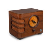 AIRKING walnut veneered mantle radio with blue enamel button advertising, ​​​​​​​25cm high.