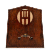 A vintage timber cased mantle radio, ​​​​​​​45cm high.