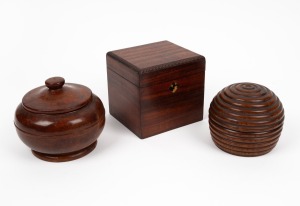 A pair of antique treen ware tobacco jars; together with an antique mahogany tea caddy, 19th century, (3 items), ​​​​​​​the tea caddy 13cm high.