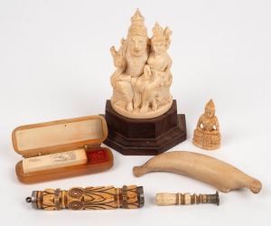 Antique whale and ivory seals, Chinese ivory seal, Inuit carved bone ornament, and two carved ivory statues, 19th/20th century, (6 items), ​​​​​​​the largest 13cm high.