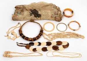 Assorted ivory and bone bangles and necklaces, together with two tribal bone and timber necklaces and a silk table coverlet, mixed vintages, (11 items)