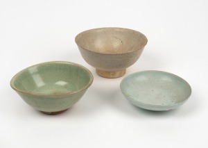 Three antique Chinese porcelain bowls, Sung, Ming and Qing Dynasties, the largest 8cm high, 15.5cm diameter.
