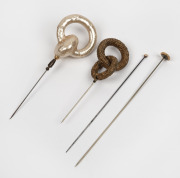 HATPINS, four vintage examples including two with gold tops, 19th/20th century, ​​​​​​​the largest 17cm long.