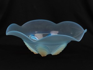 An Art Deco French opalescent frilled glass fruit bowl, 11cm high, 34cm wide.