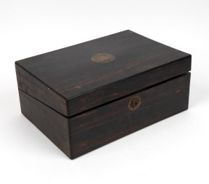 An antique coromandel writing box with fitted interior, mid 19th century, 15cm high, 35cm wide, 24cm deep.