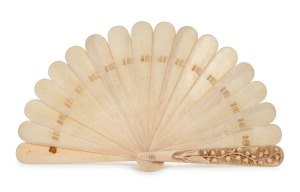 An antique ivory folding fan carved with lily of the valley and forget me not decoration, 19th century, 19.5cm high, 35cm wide when opened.