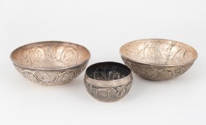 Three Eastern silver bowls, 20th century, the largest 12cm diameter, 150 grams total.