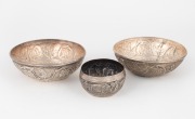 Three Eastern silver bowls, 20th century, ​​​​​​​the largest 12cm diameter, 150 grams total.