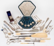 Assorted antique ivory handled implements, silver and silver plates cutlery, sterling silver sugar nips, Australian silver napkin ring in box, etc, (qty).