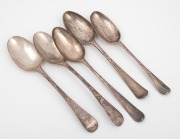 Five assorted antique sterling silver tablespoons including an 18th century Channel Islands rat-tail Hanoverian example, the largest 21.5cm long, 292 grams total.