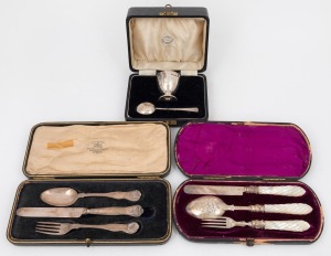 A boxed sterling silver eggcup and spoon set, together with two boxed sterling silver cutlery settings for one, 19th/20th century, (3 items).