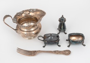 An antique sterling silver sauce boat by James Dixon & Sons of Sheffield, together with a three piece sterling silver condiment set, and a sterling silver fork, (5 items), 490 grams total.
