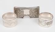 STOKES & SONS pair of antique Australian silver napkin rings, together with an antique English sterling silver calling card holder, 19th/20th century, (3 items), ​​​​​​​98 grams total.