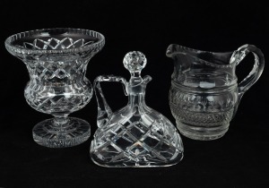 An antique English cut crystal water jug, together with a heavy crystal vase and a crystal claret jug, 19th/20th century, (3 items), ​​​​​​​the jug 18cm high.