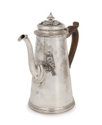 A sterling silver coffee pot made in the Georgian style with applied bird and leaf decoration, 20th century, stamped "STERLING", 21cm high, 730 grams (including timber handle).