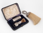 Antique sterling silver shaving set in plush fitted box, retailed by Flavelle Brothers of Sydney; together with an antique sterling silver clothes brush, 19th/20th century, the box 15cm wide.