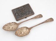 A pair of Georgian sterling silver berry spoons with engraved decoration; together with a Chinese Straits silver vintage cigarette case, early 19th and mid 20th century, (3 items), 252 grams total.