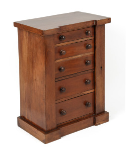 An antique mahogany and pine miniature Wellington chest of five drawers, 19th century, ​​​​​​​46cm high, 35cm wide, 22cm deep.