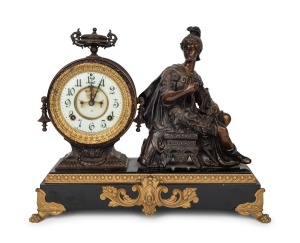 ANSOINIA "Victory" antique American mantle clock in figural cast metal case with gilt highlights, eight day time and strike movement with exposed escapement and Arabic numerals, 19th century, 37cm high.